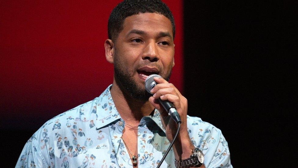 Jussie speaking on stage