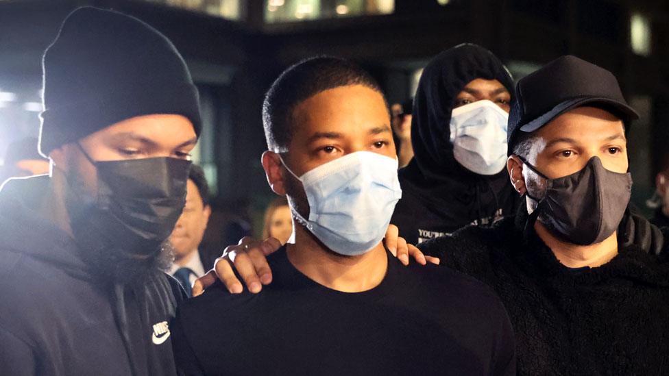 Jussie Smollett, centre, is released from the Cook County Department of Corrections detention center on 16 March 2022 in Chicago, Illinois