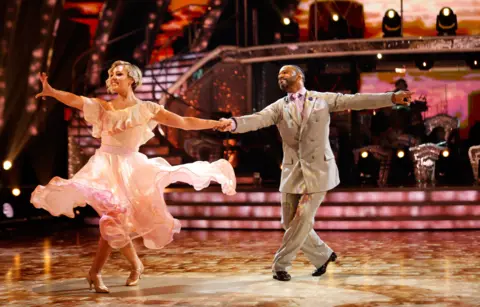 Amy Dowden and JLS singer JB Gill dancing on Strictly come dancing. 