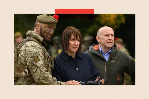 Getty Images Chancellor of the Exchequer Rachel Reeves operates a Max Evo drone as Defence Secretary John Healey (R) looks on at the Stanford Training Area 