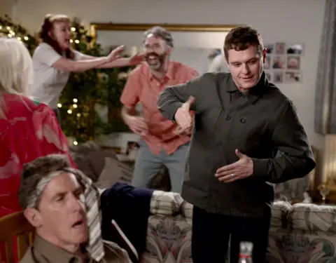 Stephen Fildes/BBC Mathew Horne dancing at a party